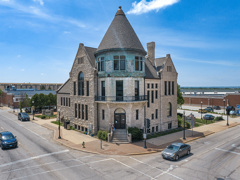 An aerial view of the History Museum on the Square with a black overlay.