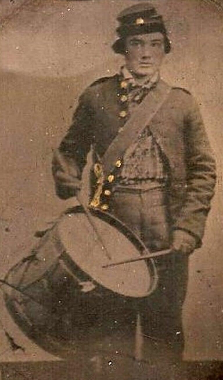 sepia colored photograph of George W Robisontc with drum