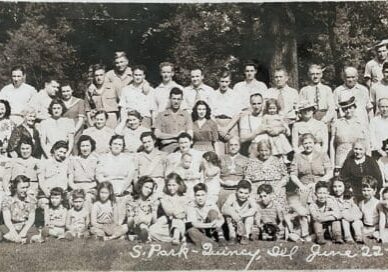 The small child with her mother in the center of the picture is one of the few people who remained in Quincy.