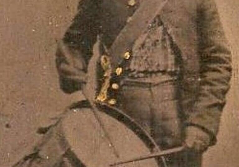 sepia colored photograph of George W Robisontc with drum